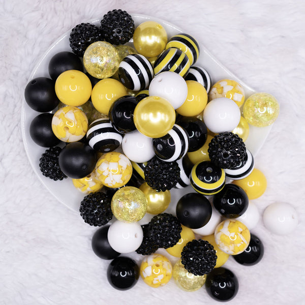 Top view of a pile of 20mm BumbleBead Black and Yellow Bubblegum Bead Mix - 20 & 50 Count