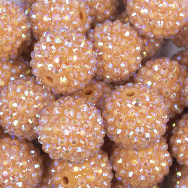 close up view of a pile of 20mm Camel Brown Rhinestone AB Bubblegum Beads