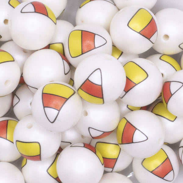 Close up view of a pile of 20mm Candy Corn print Bubblegum Beads