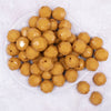 Top view of a pile of 20mm Caramel Faceted Opaque Bubblegum Beads