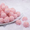 front view of a pile of 20mm Carnation Pink Rhinestone AB Acrylic Bubblegum Beads