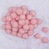 top view of a pile of 20mm Carnation Pink Rhinestone AB Acrylic Bubblegum Beads