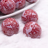 Macro view of a pile of 20mm Red Christmas Sweater Acrylic Bubblegum Beads