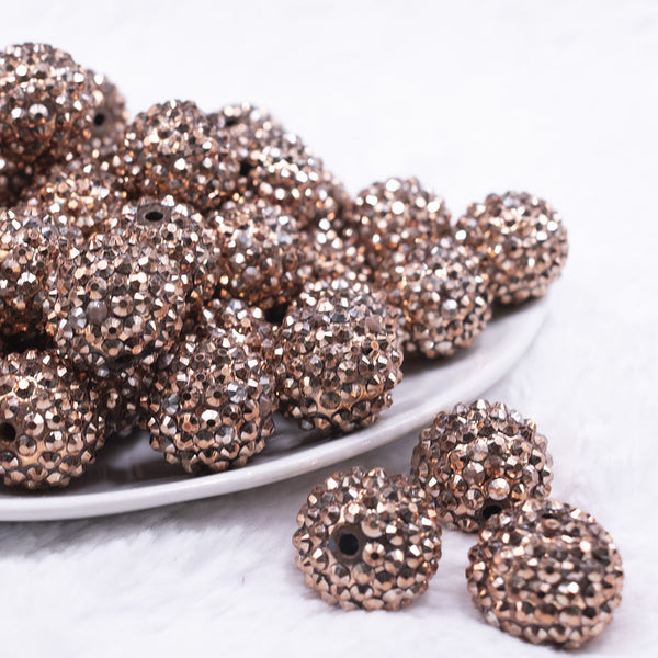 front view of a pile of 20mm Copper Brown Rhinestone AB Bubblegum Beads