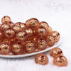 Front view of a pile of 20mm Copper Orange Foil Bubblegum Beads