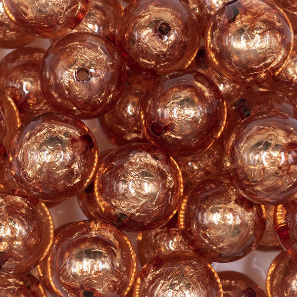 Close up view of a pile of 20mm Copper Orange Foil Bubblegum Beads
