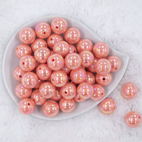 Top view of a pile of 20MM Coral Orange AB Solid Chunky Bubblegum Beads