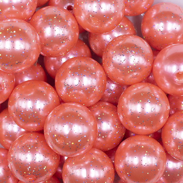 close up view of a pile of 20mm Coral Pink with Glitter Faux Pearl Bubblegum Beads