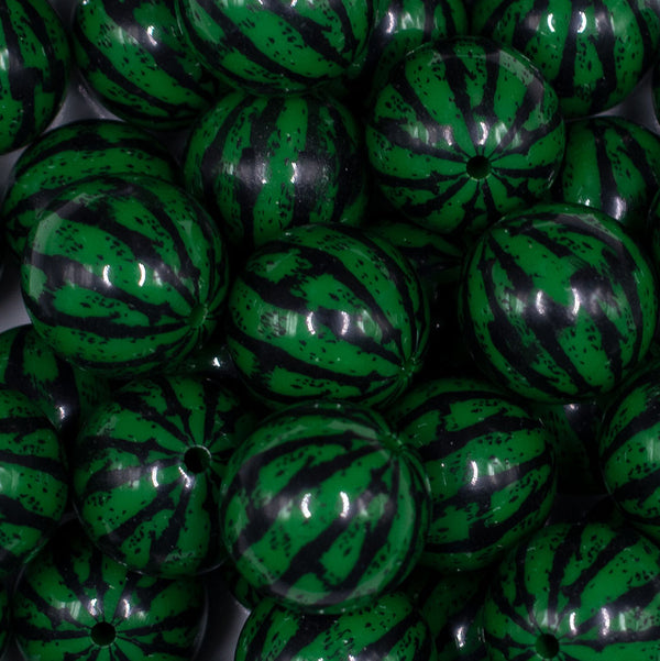 Close up view of a pile of 20MM Dark Green Watermelon Chunky Acrylic Bubblegum Beads