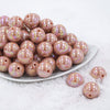 Front view of a pile of 20MM Dark Salmon AB Solid Chunky Bubblegum Beads
