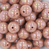 Close up view of a pile of 20MM Dark Salmon AB Solid Chunky Bubblegum Beads