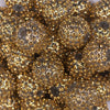 Close up view of a pile of 20mm Gold Flower Rhinestone Bubblegum Beads