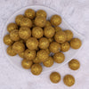 top view of a pile of 20mm Gold Sparkling Glitter Acrylic Bubblegum Beads