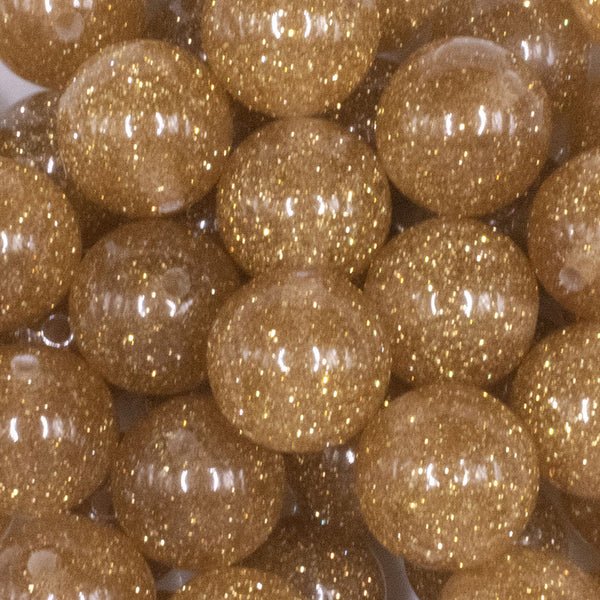 close up view of a pile of 20mm Gold Glitter Sparkle Chunky Acrylic Bubblegum Beads