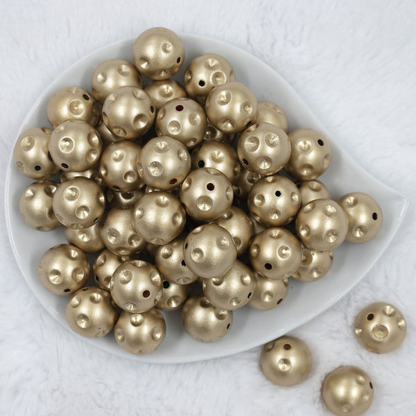 Top view of a pile of 20mm Gold Polka Dots Bubblegum Beads