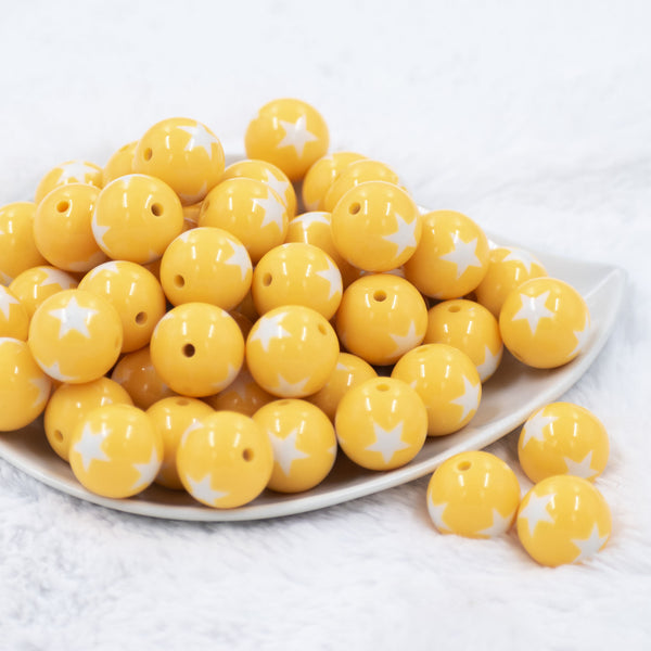 Front view of a pile of 20mm Golden Yellow with White Stars Bubblegum Beads