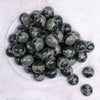 top view of a pile of 20mm Green Camoflauge Acrylic Bubblegum Beads