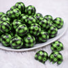 front view of a pile of 20mm Green and Black Plaid Print Bubblegum Beads