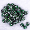 Top view of a pile of 20mm Green, Black & White Camo Acrylic Bubblegum Beads
