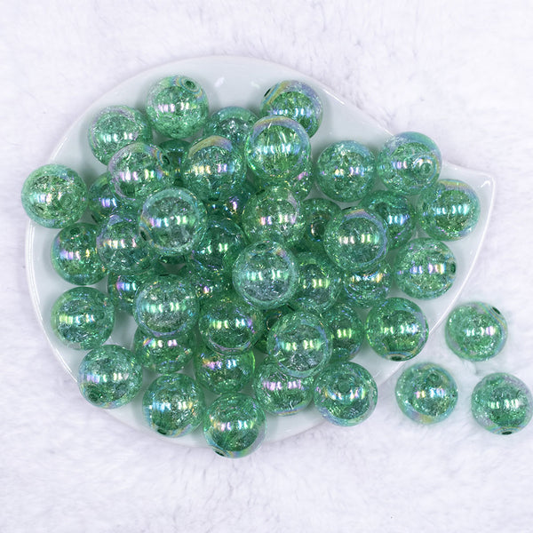 Top views of a pile of 20mm Green Crackle AB Bubblegum Beads