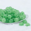 Front view of a pile of \20mm Green Crackle Bubblegum Beads