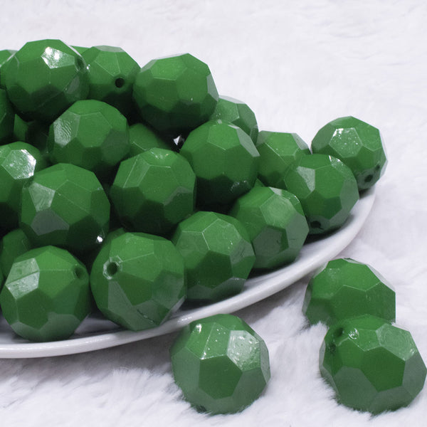 front view of a pile of 20mm Green Faceted Opaque Bubblegum Beads