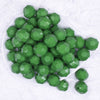 top view of a pile of 20mm Green Faceted Opaque Bubblegum Beads