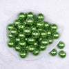 Top view of a pile of 20mm Green with Glitter Faux Pearl Bubblegum Beads