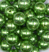 Close up view of a pile of 20mm Green with Glitter Faux Pearl Bubblegum Beads