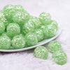 front view of a pile of 20mm Lime Green Majestic Confetti Bubblegum Beads