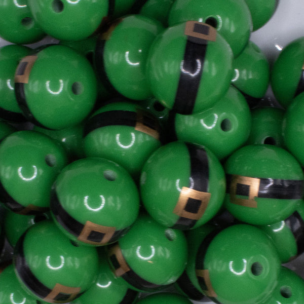 Close up view of a pile of 20mm Green Santa's Belt Acrylic Bubblegum Beads