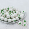 Front view of a pile of 20mm Green Shamrock Clover on matte white Chunky Bubblegum Beads