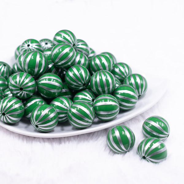 Front view of a pile of 20mm Green with Silver Pin Stripes Acrylic Bubblegum Beads