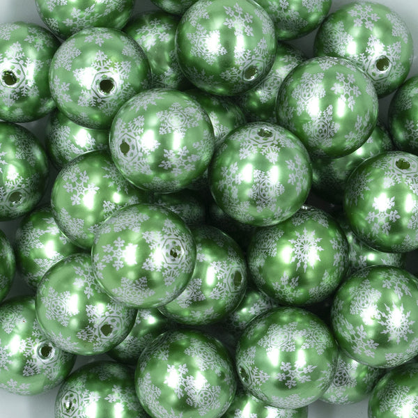 Close up view of a pile of 20mm Green Pearl with Silver Snowflake Print Acrylic Bubblegum Beads