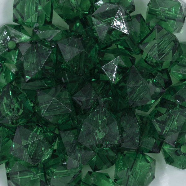 Close up view of a pile of 20mm Green Transparent Cube Faceted Bubblegum Beads