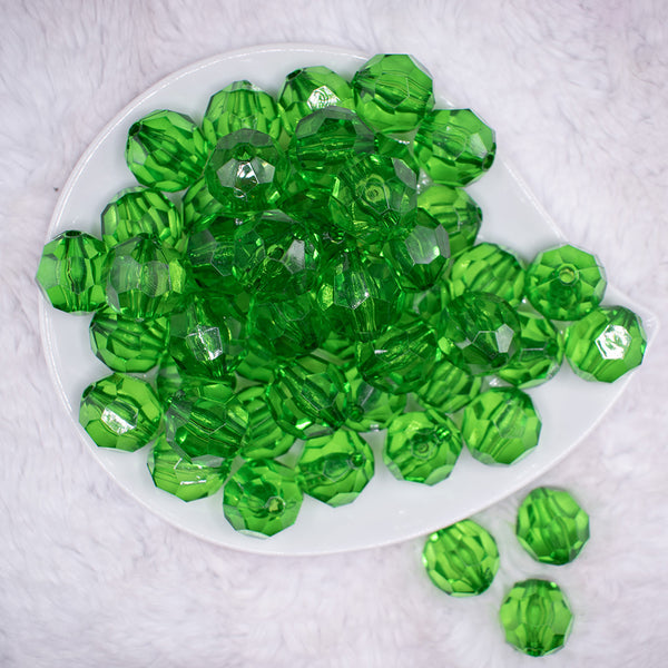 top view of a pile of 20mm Green Transparent Faceted Bubblegum Beads