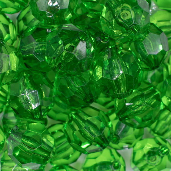 close up view of a pile of 20mm Green Transparent Faceted Bubblegum Beads