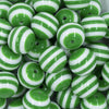 Close up view of a pile of 20mm Green with White Stripe Chunky Bubblegum Beads