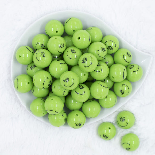 Top view of a pile of 20mm Grinch Smirk Face Print Chunky Acrylic Bubblegum Beads [10 Count]