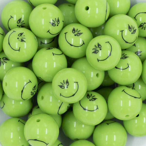 Close up view of a pile of 20mm Grinch Smirk Face Print Chunky Acrylic Bubblegum Beads [10 Count]