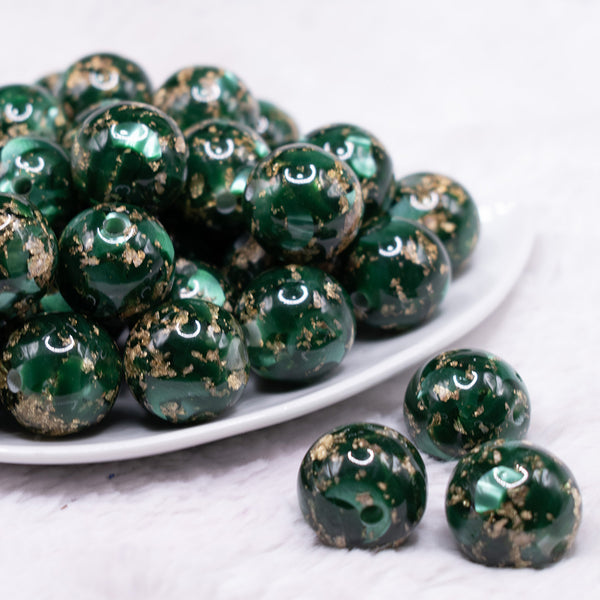 front view of a pile of 20mm Green and Gold Flake Resin Chunky Bubblegum Beads