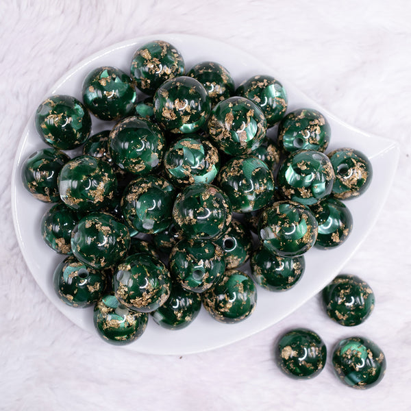 top view of a pile of 20mm Green and Gold Flake Resin Chunky Bubblegum Beads