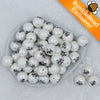 Top view of a a pile of 20mm Scissors Print Chunky Acrylic Bubblegum Beads [10 Count]