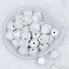 Top view of a pile of 20mm White Painted Hexagon Wooden Beads