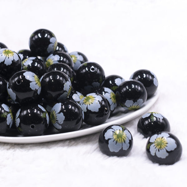 Front view of a pile of 20mm Hibiscus flower print on Black Chunky Acrylic Bubblegum Beads [10 Count]