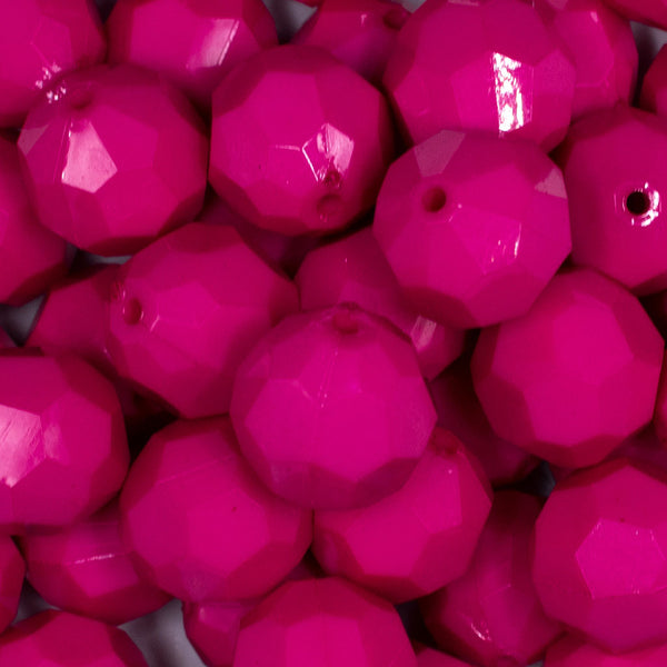 Close up view of a pile of 20mm Hot Pink Opaque Faceted Bubblegum Beads
