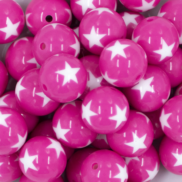 Close up view of a pile of 20mm Hot Pink with White Stars Bubblegum Beads