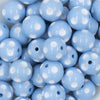 Close up view of a pile of 20mm Ice Blue with White Polka Dots Bubblegum Beads