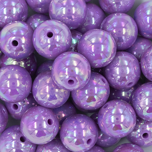 Close up view of a pile of 20MM Iris Purple AB Solid Chunky Bubblegum Beads