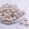 Front view of a pile of 20mm Ivory with Glitter Faux Pearl Bubblegum Beads